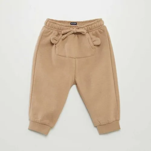 jogging avec poche animée beige jogging avec poche animée beige