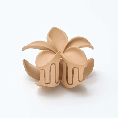 pince à cheveux en forme de fleur beige