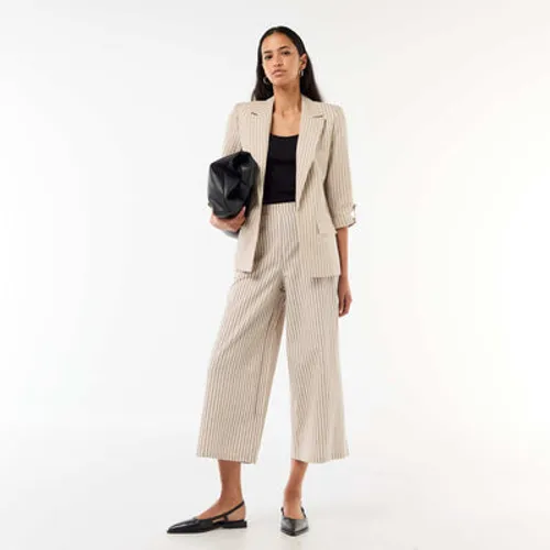 pantalon large en lin mélangé beige pantalon large en lin mélangé beige